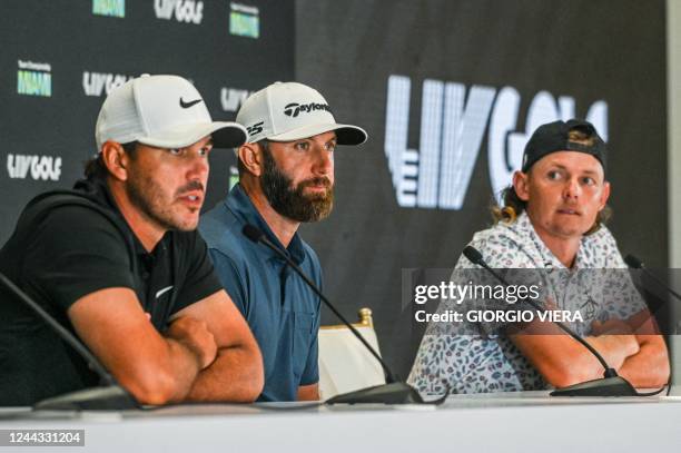 Golfers Brooks Koepka and Dustin Johnson and Australian golfer Cameron Smith deliver a press conference at the end of the semifinals of the 2022 LIV...