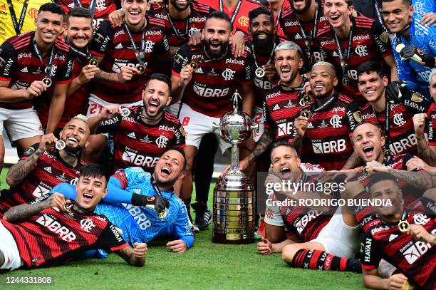 Players of Flamengo celebrate with the trophy after winning the Copa Libertadores final, after the football match between Brazilian teams Flamengo...