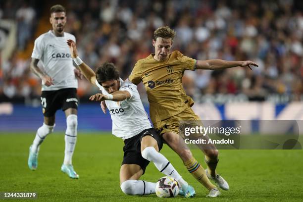 October: Jesus Vazquez Left-Back of Valencia and Spain and Frenkie de Jong central midfield of Barcelona and Netherlands compete for the ball during...