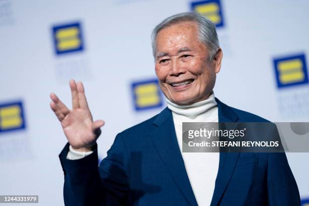 Actor George Takei makes a Vulcan salute as he attends the annual Human Rights Campaign National Dinner, in Washington, DC, on October 29, 2022. -...