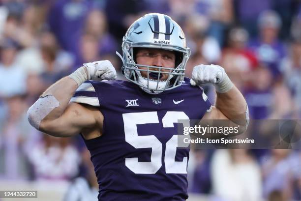 Kansas State Wildcats linebacker Nick Allen flexes after a tackle for loss in the fourth quarter of a Big 12 college football game between the...