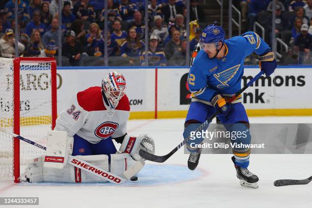 Jake Allen of the Montreal Canadiens makes a save against Noel Acciari of the St. Louis Blues during the first period of the game at Enterprise...