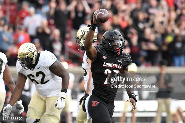 Louisville Cardinals linebacker K.J. Cloyd reacts after coming up
