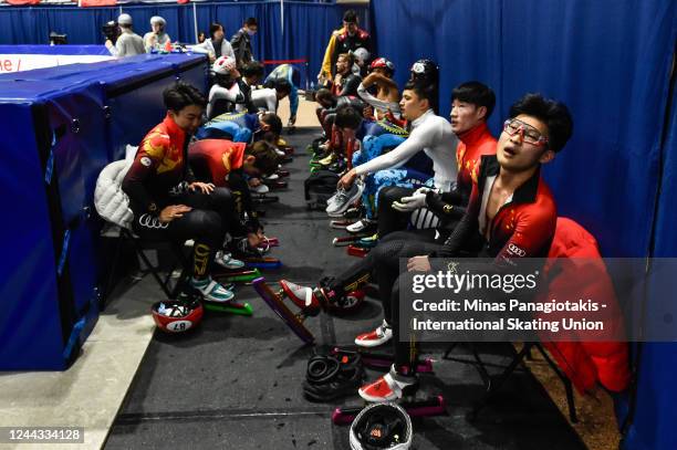 Team china, Team Kazakhstan, Team Japan and Team Canada await the official results in heat 1 of the men's 5000 meter relay semifinal during the ISU...