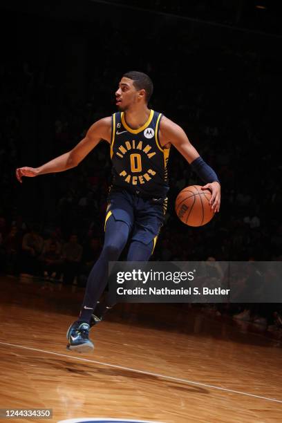 Tyrese Haliburton of the Indiana Pacers dribbles the ball during the game against the Brooklyn Nets on October 29, 2022 at Barclays Center in...