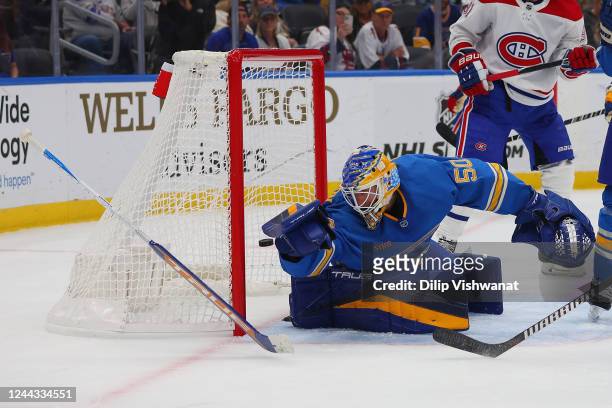 Jordan Binnington of the St. Louis Blues allows a goal against the Montreal Canadiens during the second period of the game at Enterprise Center on...