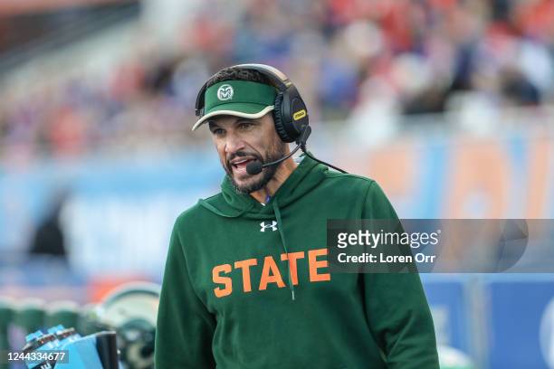 Head Coach Jay Norvell of the Colorado State Rams talks with his fellow coaches during the first half of the game against the Boise State Broncos at...
