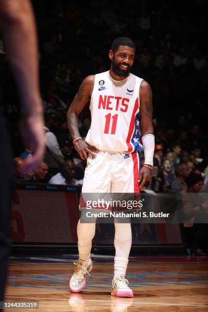 Kyrie Irving of the Brooklyn Nets smiles during the game against the Indiana Pacers on October 29, 2022 at Barclays Center in Brooklyn, New York....