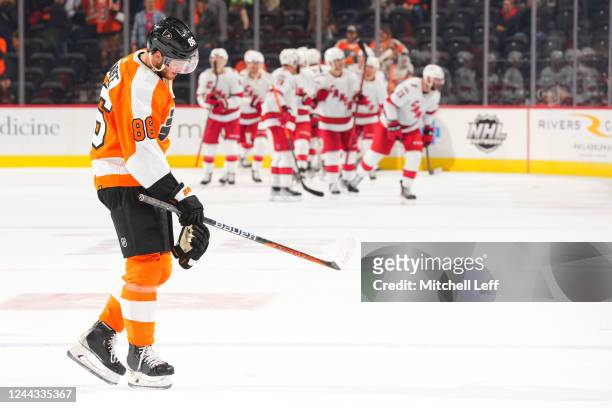 Joel Farabee of the Philadelphia Flyers skates off the ice after losing to the Carolina Hurricanes in overtime at the Wells Fargo Center on October...
