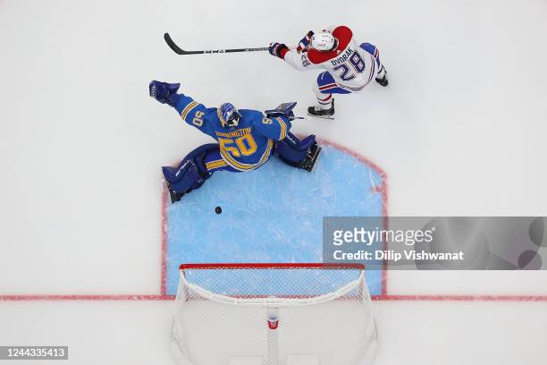 Christian Dvorak of the Montreal Canadiens scores a goal against Jordan Binnington of the St. Louis Blues during the third period of the game at...