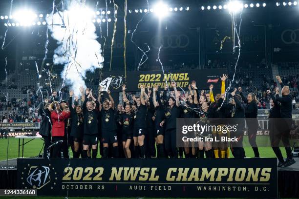 Members of the Portland Thorns FC lift the trophy to celebrate winning the National Womens Soccer League Championship Match against Kansas City...