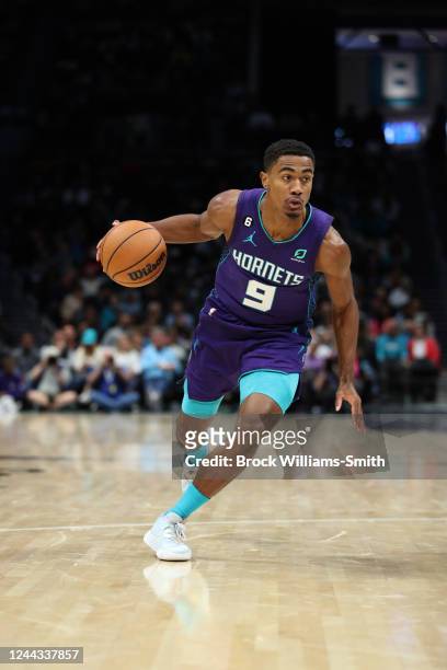 Theo Maledon of the Charlotte Hornets handles the ball during the game against the Golden State Warriors on October 29, 2022 at Spectrum Center in...