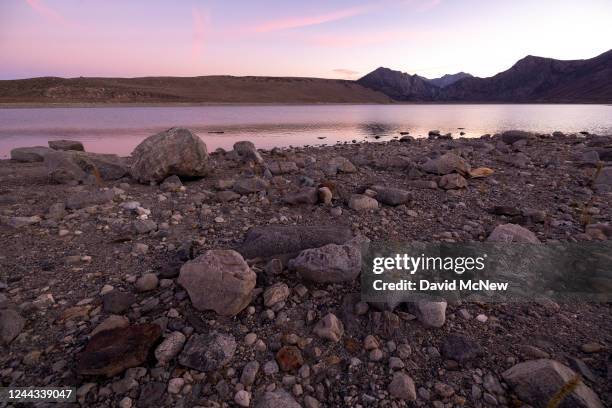 An widening shoreline is seen at drought-shrunken Grant Lake as the fall color season comes to an end with a rare third year of La Niña expectedly...