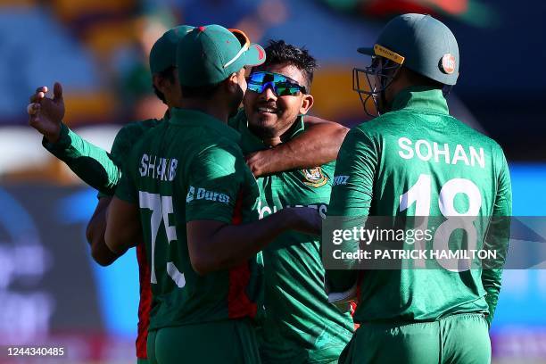 Bangladesh's Captain Shakib Al Hasan celebrates with the teammates during the ICC men's Twenty20 World Cup 2022 cricket match between Bangladesh and...