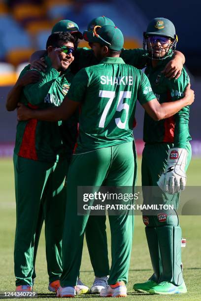 Bangladesh's Captain Shakib Al Hasan celebrates with teammates during the ICC men's Twenty20 World Cup 2022 cricket match between Bangladesh and...