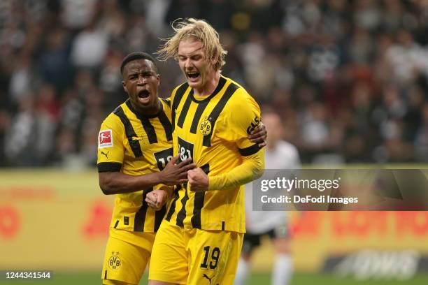 Julian Brandt of Borussia Dortmund celebrates after scoring his team's first goal with teammates during the Bundesliga match between Eintracht...