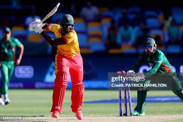 Zimbabwe's Richard Ngarava is dismissed during the ICC men's Twenty20 World Cup 2022 cricket match between Bangladesh and Zimbabwe at The Gabba on...