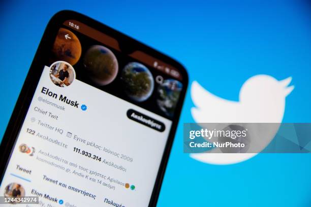 In this photo illustration Elon Musk Twitter seen displayed on a smartphone screen with Twitter logo in the background in Athens, Greece on October...