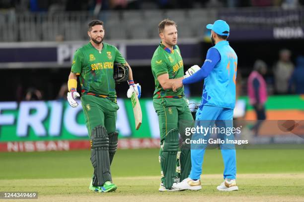 David Miller of proteas hand shake with Indian player Virat Kohli after winning the game 2022 ICC Men's T20 World Cup match between South Africa and...