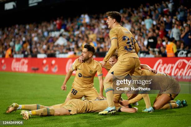 Robert Lewandowski of FC Barcelona celebrates after scoring their side's first goal with his teammates during the LaLiga Santander match between...