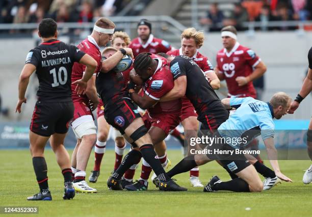 Referee Wayne Barnes gets knocked over during the Gallagher Premiership Rugby match between Saracens and Sale Sharks at StoneX Stadium on October 30,...