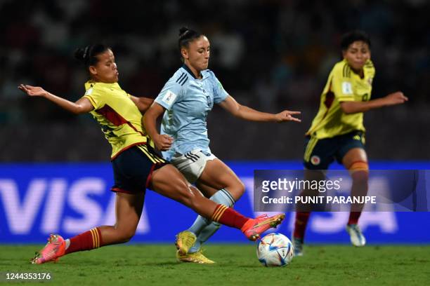 Spain's Olaya Enrique and Colombia's Juana Ortegon fight for the ball during the FIFA U-17 womens football World Cup 2022 final match between...