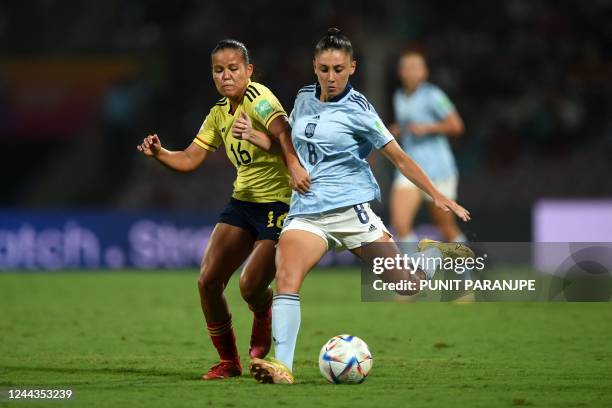 Spain's Olaya Enrique and Colombia's Juana Ortegon fight for the ball during the FIFA U-17 womens football World Cup 2022 final match between...