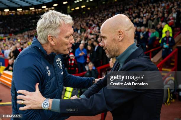 Manchester United Head Coach / Manager Erik ten Hag greets West Ham United Manager / Head Coach David Moyes prior to the Premier League match between...