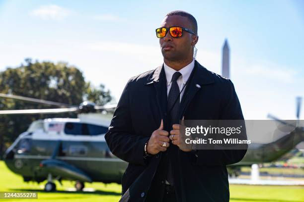 Secret Service agent is seen as Marine One prepares to take off with President Joe Biden on the South Lawn of the White House for a trip to...