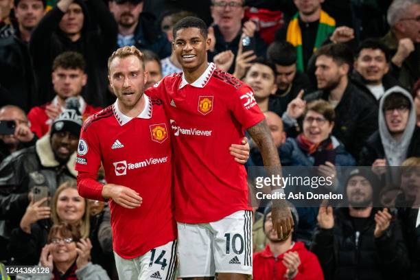 Marcus Rashford of Manchester United celebrates scoring a goal to make the score 1-0 with team-mate Christian Eriksen during the Premier League match...