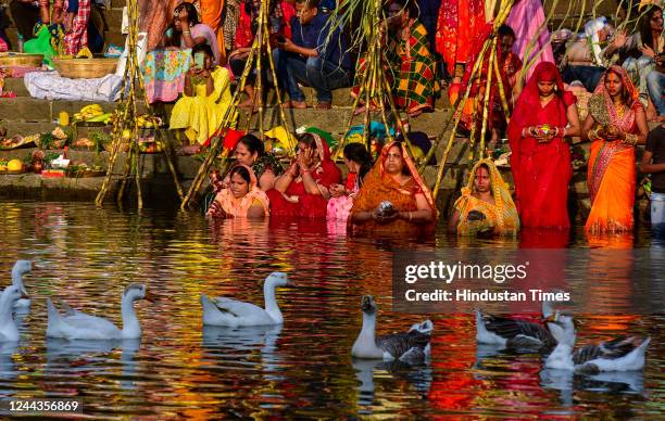 Chhatt Devotees offer prayers during the Chhath Puja Festival at Banganga ...