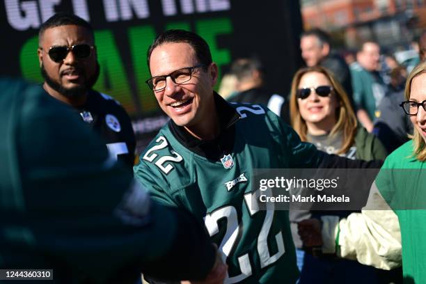 Democratic nominee for Governor Josh Shapiro and Democratic Lt. Governor candidate Anthony Davis tailgate with supporters before attending the game...