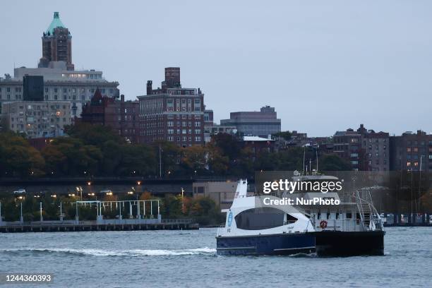 View of Brooklyn and a ferry on the East River in New York City, United States on October 23, 2022.