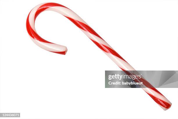 isolated candy cane with clipping path - candy cane stock pictures, royalty-free photos & images