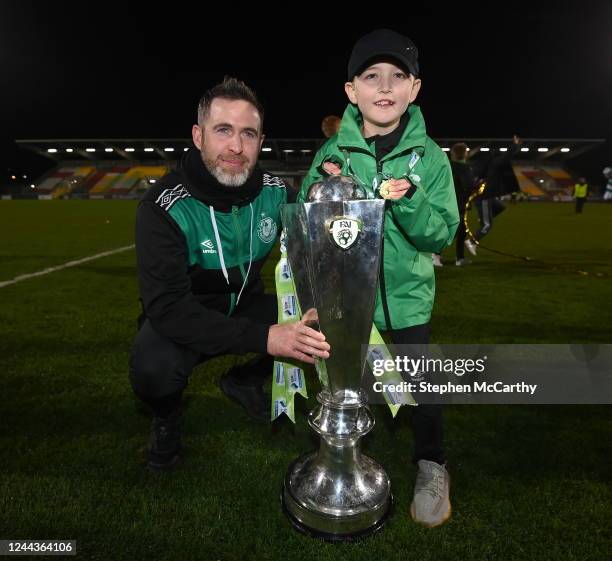 Dublin , Ireland - 30 October 2022; Shamrock Rovers manager Stephen Bradley with his son Josh and the SSE Airtricity League Premier Division trophy...