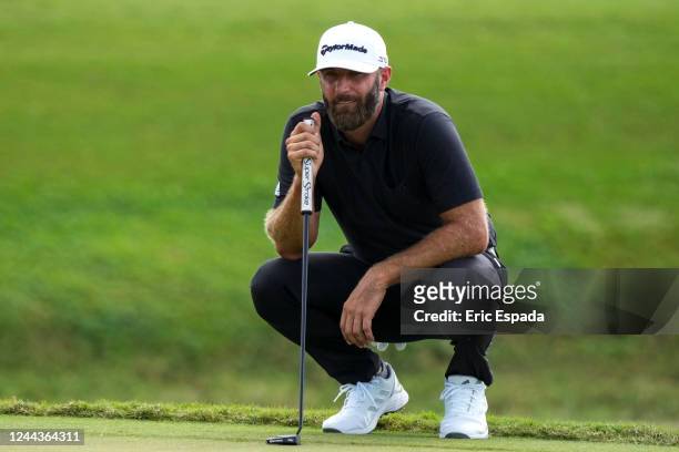 Team Captain Dustin Johnson of 4 Aces GC lines up a putt on the fourth green during the team championship stroke-play round of the LIV Golf...