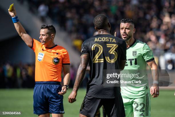 Kellyn Acosta of Los Angeles FC has words with Maximiliano Urruti of Austin FC during the MLS Cup Western Conference Final match at the at Banc of...