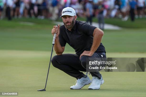 Team Captain Dustin Johnson of 4 Aces GC lines up a putt on the 18th green during the team championship stroke-play round of the LIV Golf...