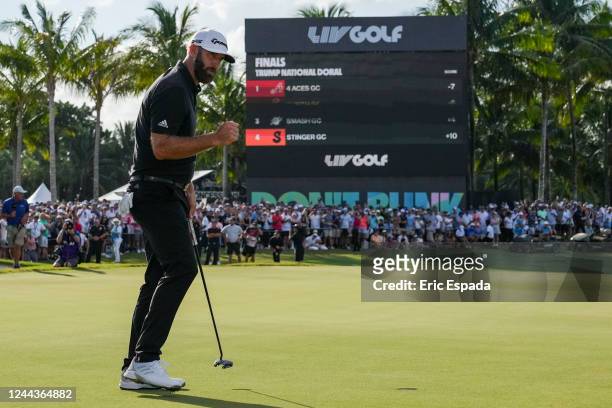 Team Captain Dustin Johnson of 4 Aces GC pumps his fist after sinking the winning putt on the 18th green during the team championship stroke-play...