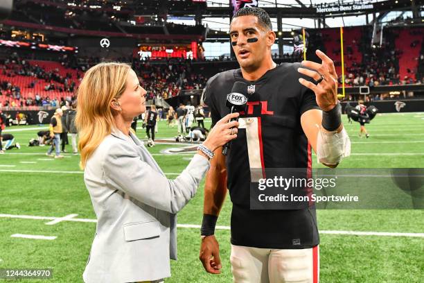 Atlanta quarterback Marcus Mariota is interviewed by Foxs Shannon Spake following the conclusion of the NFL game between the Carolina Panthers and...