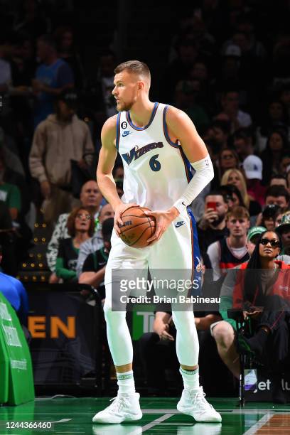 Kristaps Porzingis of the Washington Wizards handles the ball during the game against the Boston Celtics on October 30, 2022 at the TD Garden in...