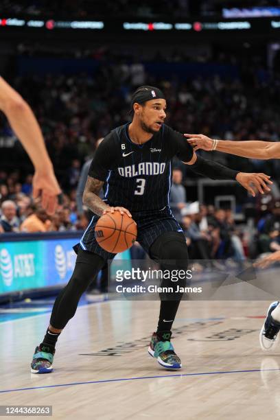 Chuma Okeke of the Orlando Magic handles the ball during the game against the Dallas Mavericks on October 30, 2022 at the American Airlines Center in...