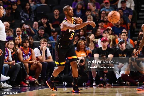 Chris Paul of the Phoenix Suns passes the ball during the game during the game against the Houston Rockets on October 30, 2022 at Footprint Center in...