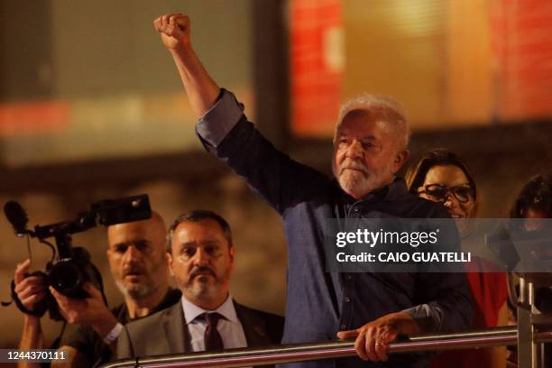 Brazilian president-elect for the leftist Workers Party Luiz Inacio Lula da Silva greets supporters at the Paulista avenue after winning the...