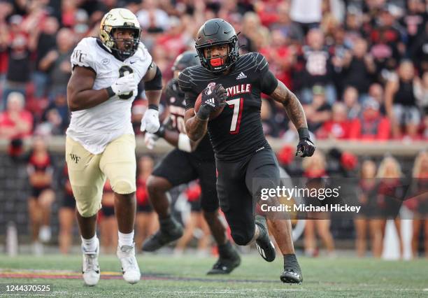 Tiyon Evans of the Louisville Cardinals runs the ball during the game against the Wake Forest Demon Deacons at Cardinal Stadium on October 29, 2022...