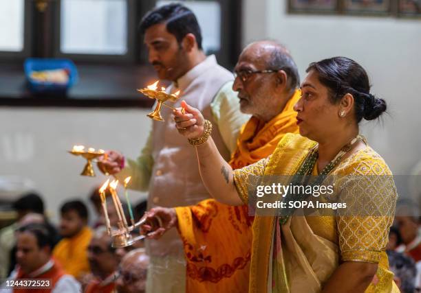 Members of a Hindu Temple perform a ritual during a Diwali celebration. Diwali is a five-day religious festival in Hinduism, which symbolizes the...