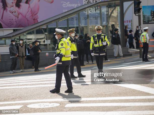 Security measurements are taken outside a subway station in the district of Itaewon in Seoul on October 31 two days after a deadly Halloween crowd...