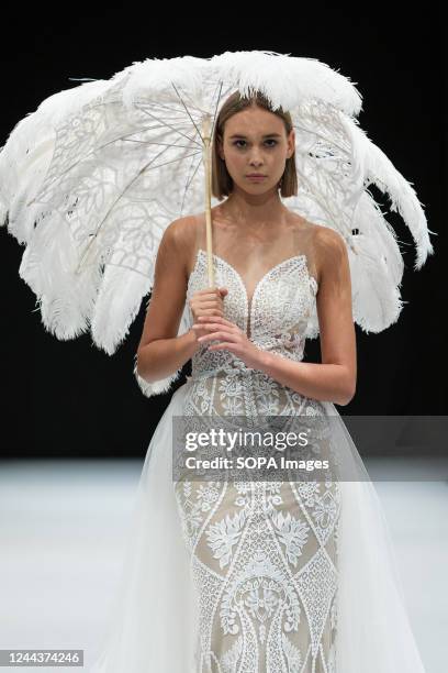 Model walks the runway at the Driver Luengo fashion show during the1001 Bodas Madrid Fashion Week at the Ifema in Madrid.