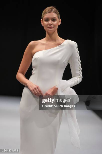 Model walks the runway at the Nicolas Montenegro fashion show during the 1001 Bodas Madrid Fashion Week at the Ifema in Madrid.