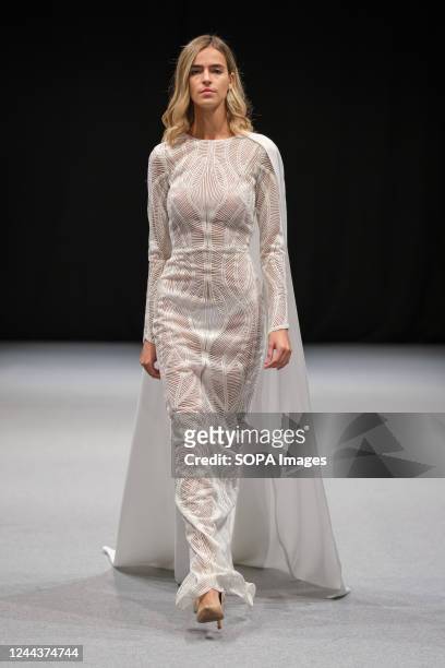 Model walks the runway at the Nicolas Montenegro fashion show during the 1001 Bodas Madrid Fashion Week at the Ifema in Madrid.